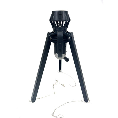 The Higdon Outdoors Motion Machine, a black tripod device with three angled legs and wire attachments, lies on the ground—an ideal water motion tool for boosting your decoy spread—shown against a white background.